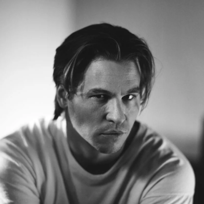 Val Kilmer in black and white photo